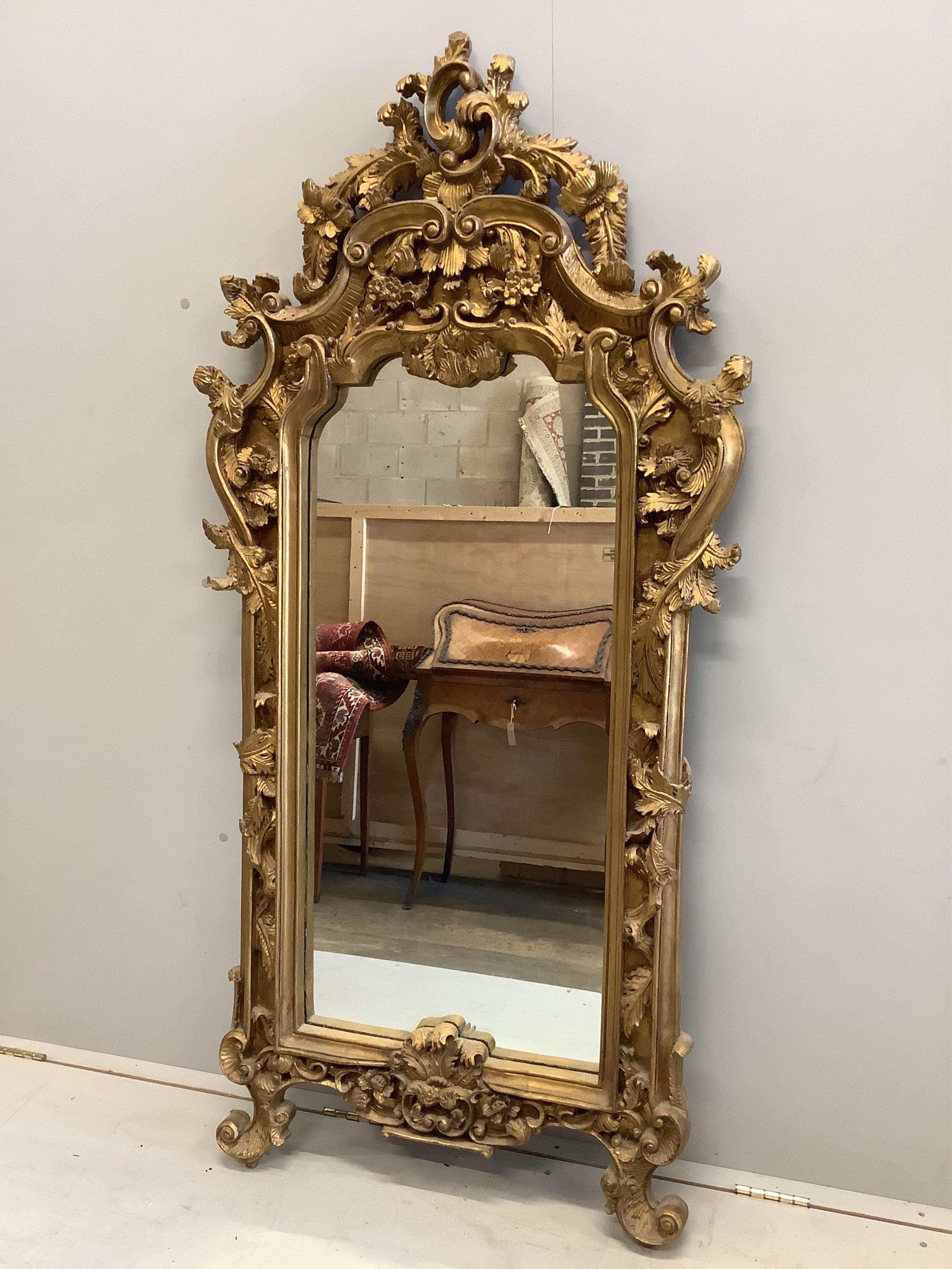 A Victorian style gilt composition wall mirror, width 82cm, height 165cm
